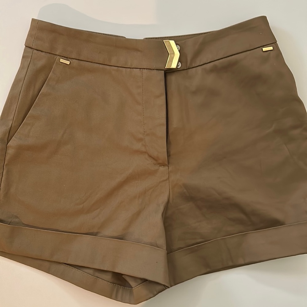 High-wasted shorts tan with gold detail at button